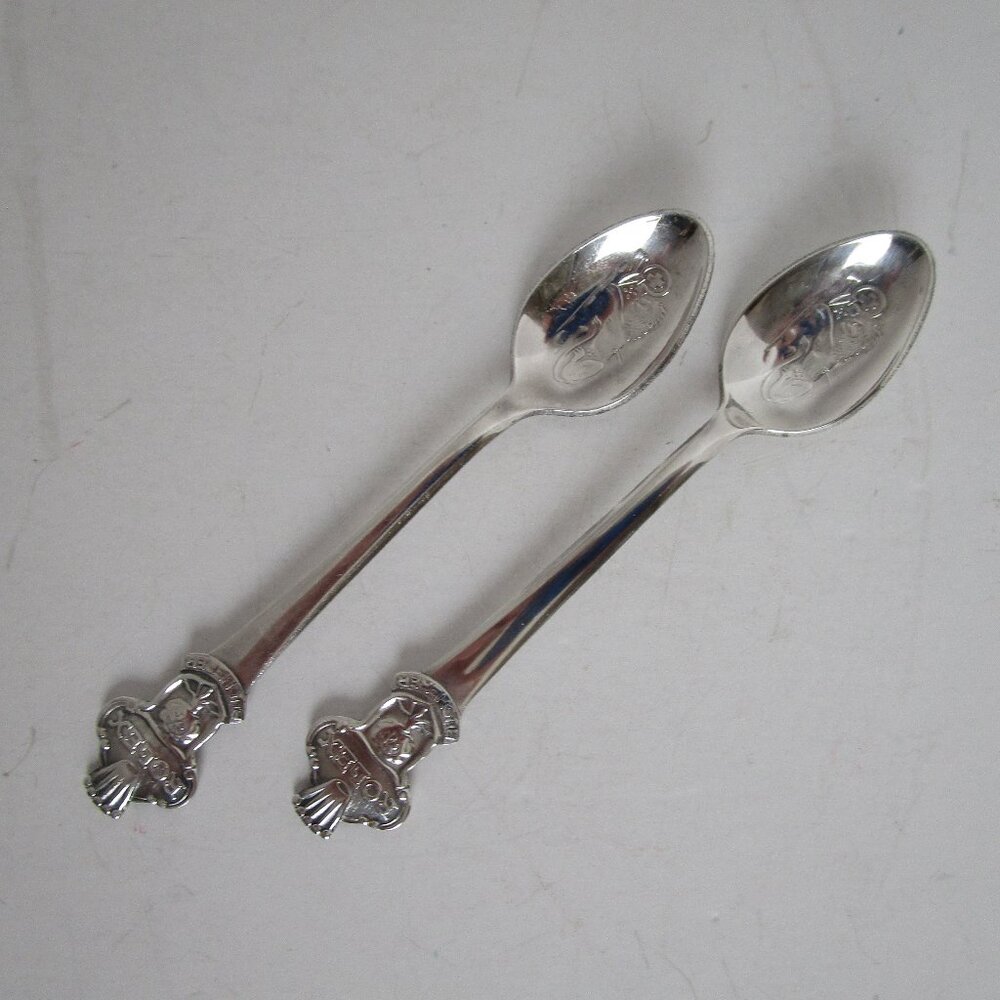 pair of silver ROLEX demitasse spoons